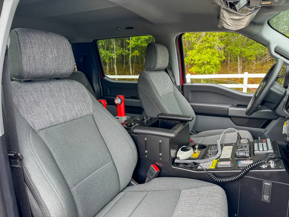 Roof control-panel close-up showing labeled emergency-light controls.